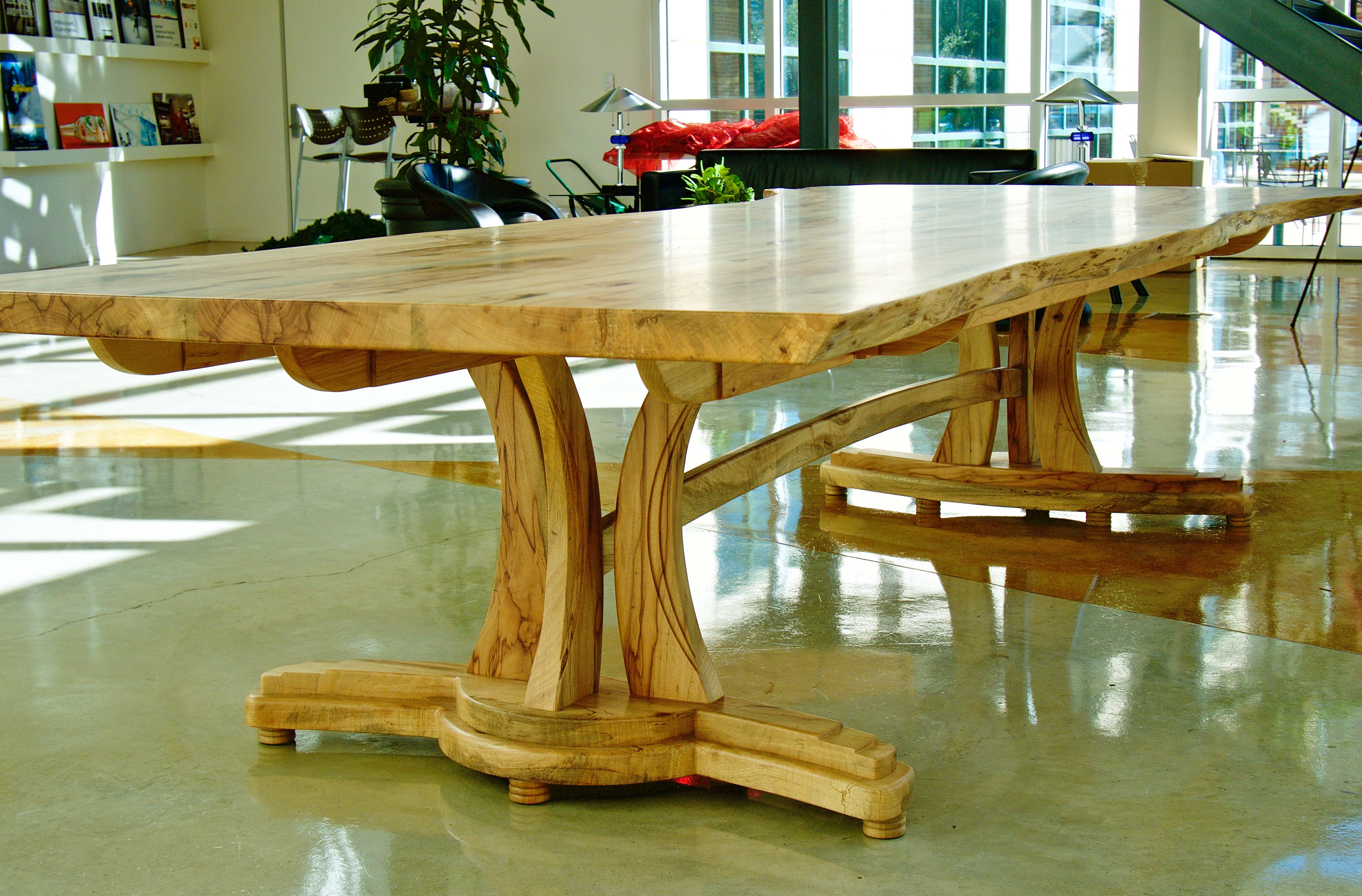 Live edge Texas pecan conference table with sculpted base.
